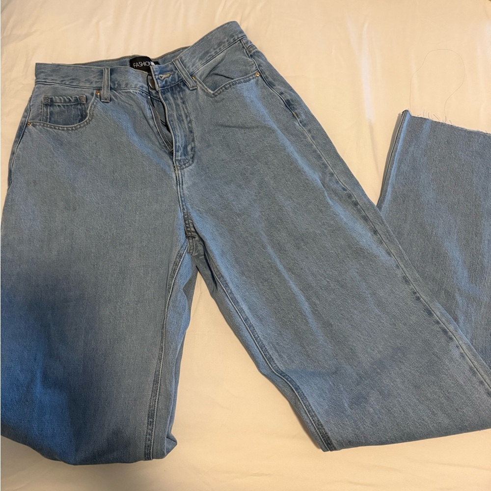 Fashion nova Classic Blue Denim Jeans. Original tags. Great fit. Size 9